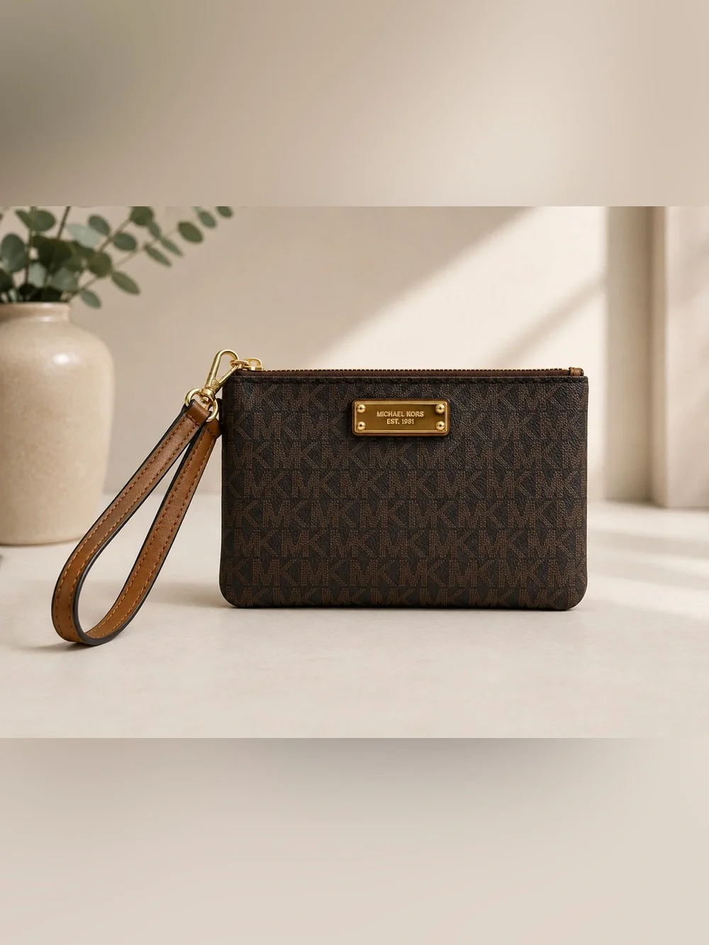 Michael Kors Brown and Tan Signature Wristlet with Gold Plate